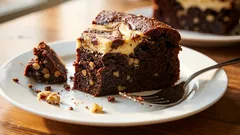 Nie sposób odmówić: pyszny przepis na tort czekoladowy z kremem i orzechami